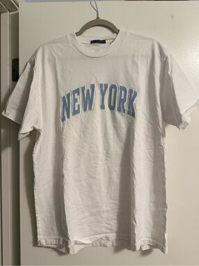 White Brandy Melville Tee, "New York" university-style patch letters